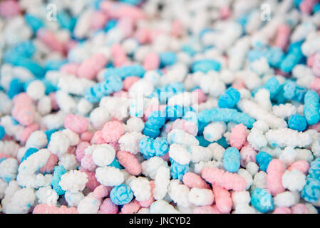 Coloured Sugar Coated Peanuts in marketplace of Cefalu, Italy Stock Photo