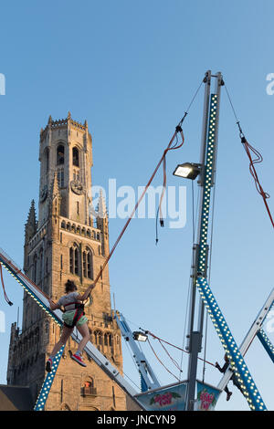 Children enjoying playground on Grote Markt in Brugge, Sunday 9 April 2017, Brugge, Belgium Stock Photo