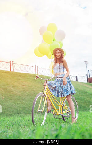 pretty girl with bicycle Stock Photo - Alamy