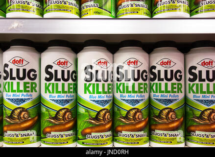 packs of Doff slug killer in a garden supplies store Stock Photo