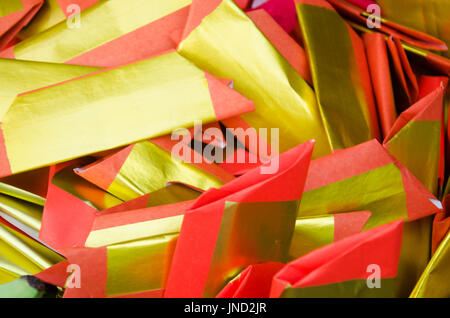 People burn joss paper gold and silver paper for worship with paper made to resemble money and burned as sacrificial offering for pray to god and memo Stock Photo