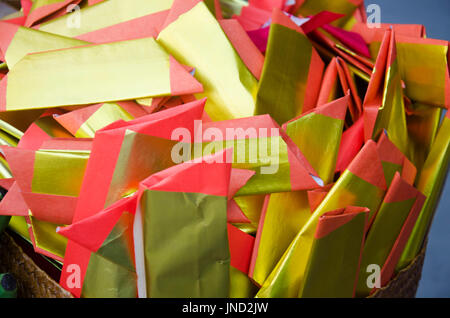 People burn joss paper gold and silver paper for worship with paper made to resemble money and burned as sacrificial offering for pray to god and memo Stock Photo