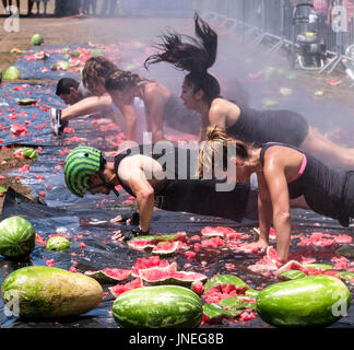 Los Angeles, USA. 29th July, 2017. People play games at the 55th Annual California Watermelon Festival in Los Angeles, the United States, July 29, 2017. Credit: Zhao Hanrong/Xinhua/Alamy Live News Stock Photo