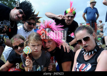 Lulworth Castle, Dorset, UK. 30th July, 2017. Festival goers in fancy dress enjoy the sunshine on the final day of Camp Bestival. Credit: David Partridge/Alamy Live News Stock Photo