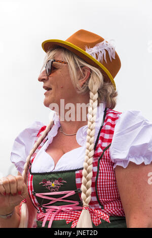 Swanage, Dorset, UK. 30th July, 2017. Visitors flock to Swanage to watch the procession parade, as part of Swanage Carnival week. The theme this year is Swanage Goes Global for participants to show the national dress or characteristics of their favourite country. Participants take part in the carnival procession. Credit: Carolyn Jenkins/Alamy Live News Stock Photo