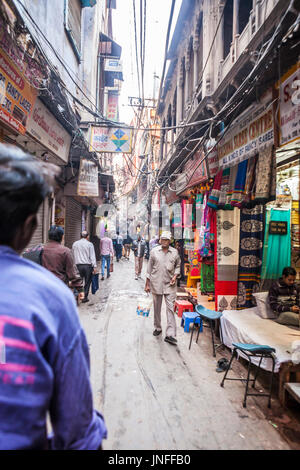 A street scene in Chandni Chowk, one of the oldest and busiest markets in Delhi, India. Stock Photo