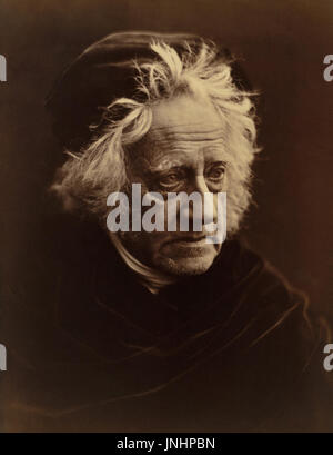 Sir John Herschel (1792-1871) was an English polymath, astronomer, mathematician, chemist, inventor, and key figure in the development of photography. He invented cyanotype photography and various processes that that aided other early photography pioneers, including Daguerre. Herschel is also credited with coining the term photography in 1839. (Photograph by Julia Margaret Cameron in April, 1867) Stock Photo