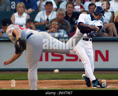 FILE - In this Sept. 22, 2004, file photo, Boston Red Sox's David Ortiz  watches the flight of his two run, home run off Baltimore Orioles starter  Sidney Ponson, in the seventh