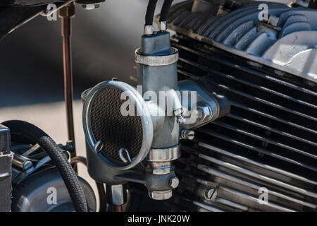 Old antique motor and its carburettor at the engine Stock Photo