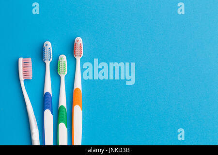 Colorful toothbrushes, space for text Stock Photo