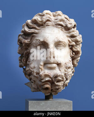 Head of Zeus. Late 2nd century AD. Rome, marble. Father gods face. Traces of red color, probably painted. Stock Photo