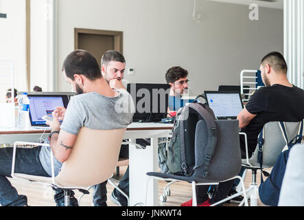 Istanbul, Turkey - July 21, 2017: Young college students studying with laptops in the university library/study room Stock Photo
