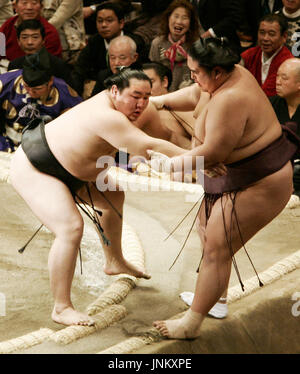 TOKYO, Japan - Yokozuna Asashoryu (L) rebounded from an