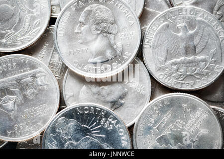 Extreme close up picture of United States quarter dollar coins, shallow depth of field. Stock Photo