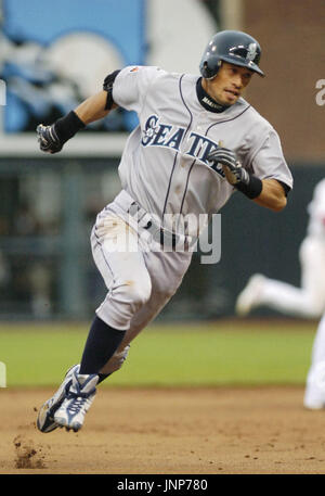 Seattle Mariners' Ichiro Suzuki lets a ball go by after getting ready to  bunt against the San Francisco Giants in the fourth inning in a baseball  game, Saturday, June 17, 2006, in