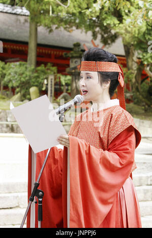 NARA, Japan - Top Japanese singer Sachiko Kobayashi performs her new song at Kasuga Shrine in Nara Prefecture on June 22. The song is based on ancient poems taken from the Manyoshu, the oldest existing collection of Japanese poetry. Kobayashi, who wore traditional costume, dedicated the song to the shrine. (Kyodo)