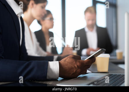 Man working on a mobile phone. Concept of internet sharing and interconnection Stock Photo