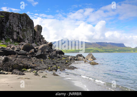 Looking towards The Quirang from Staffin beach, on the Isle of Skye, Scotland Stock Photo