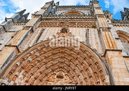 The carved entrance portal to St Mary of Victory Monastery in Batalha, Portugal. Stock Photo