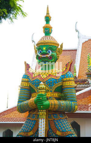 Green demon guardian aka Thotsakan (Green Giant) at Wat Arun (Temple of Dawn) in Bangkok, Thailand Stock Photo