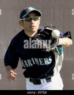 Seattle Mariners right fielder Ichiro Suzuki, playing for Japan in the  World Baseball Classic, stretches during practice near the tournament logo  at Angel Stadium in Anaheim, California on March 11, 2006. Japan