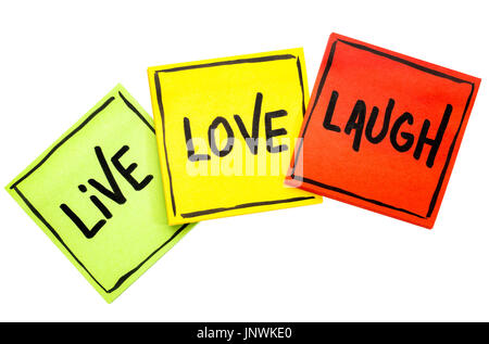 live, love, laugh - motivational words on sticky note reminders isolated on white Stock Photo