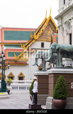 Bangkok, Thailand - February 18, 2015: Palace guard on duty at the Grand Palace in Bangkok, Thailand. Stock Photo