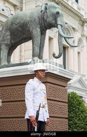 Bangkok, Thailand - February 18, 2015: Palace guard on duty at the Grand Palace in Bangkok, Thailand. Stock Photo