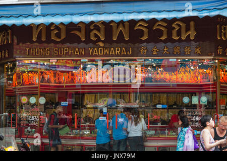 Bangkok, Thailand - February 18, 2015: Goldsmith shop in the Yaowarat road in Chinatown, Bangkok. Yaowarat road is the gold district in Chinatown, Bangkok. Stock Photo