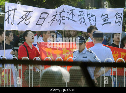 BEIJING, China - People stage a demonstration in front of the Japanese Embassy in Beijing on Sept. 17, 2012, to protest Japan's purchase on Sept. 11 of three islets of the Japan-controlled Senkaku Islands in the East China Sea, called the Diaoyu Islands in China which claims them. Anti-Japan demonstrations have taken place in Beijing for seven consecutive days since Japan's nationalization of the islets. (Kyodo)