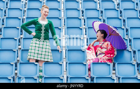 Edinburgh, UK. 31st Jul, 2017. Michiko Matsunaga Japeanese Defence force band, Scottish Dancer Caroline Drummond The Royal Edinburgh Military Tattoo reveals an array of international acts to celebrate this year's Splash of Tartan - Scotland's August extravaganza returns with a stellar line up of the world's best military performers The Royal Edinburgh Military Tattoo is set to celebrate, unveiling a stellar line up of acts set to descend on Scotland's capital for the 2017 Show today (Monday, 31 July). Credit: IAN GEORGESON/Alamy Live News Stock Photo