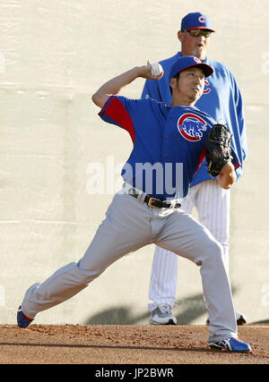Chicago Cubs pitcher Kyuji Fujikawa, of japan, poses for photos at ...