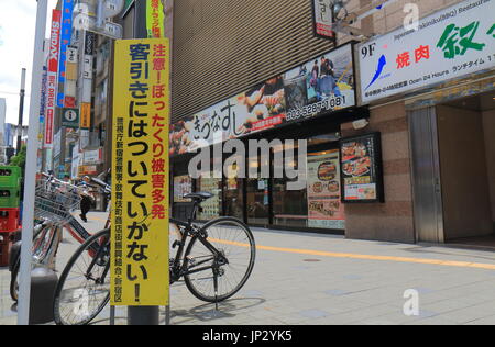 Waring sign for touts in Kabukicho red light district Shinjuku in Tokyo Japan. Stock Photo