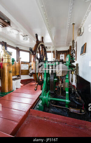 Restored, World war two stream tugboat, Cervia. Interior of the wheelhouse with bridge and ship's wheel. Stock Photo