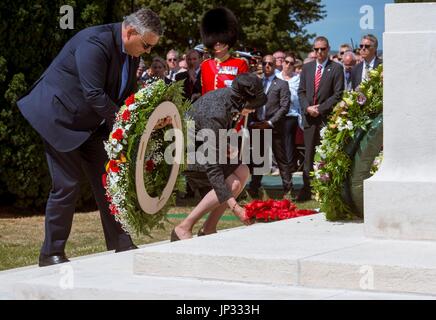 Prime Minister Theresa May and Steven Vandeput, Minister of Defence for Belgium lay wreaths on the Stone of Remembrance at Tyne Cot Commonwealth War Graves Cemetery in Ypres, Belgium, at a commemoration ceremony to mark the centenary of Passchendaele. Stock Photo