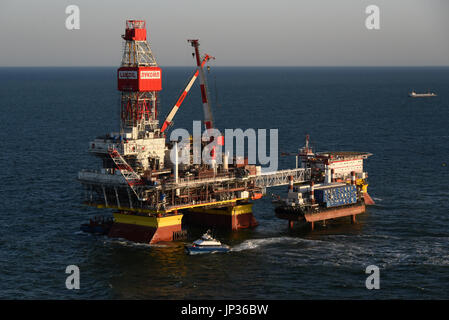 Oil rig platform on Lukoil Filanovsky oil field at the Caspian Sea, Astrakhan region, Russia Stock Photo