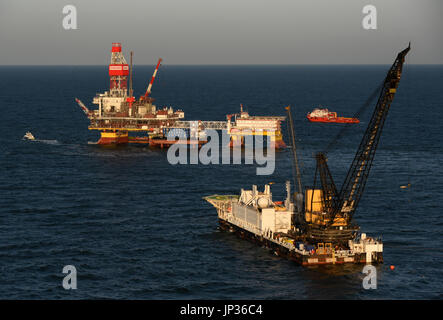 Oil rig platform on Lukoil Filanovsky oil field at the Caspian Sea, Astrakhan region, Russia Stock Photo