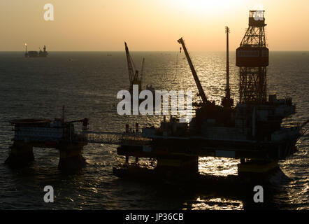 Oil rig platform on Lukoil Filanovsky oil field at the Caspian Sea, Astrakhan region, Russia Stock Photo