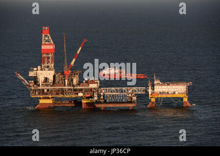 Oil rig platform on Lukoil Filanovsky oil field at the Caspian Sea, Astrakhan region, Russia Stock Photo