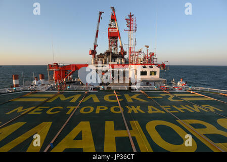 Oil rig platform on Lukoil Filanovsky oil field at the Caspian Sea, Astrakhan region, Russia Stock Photo