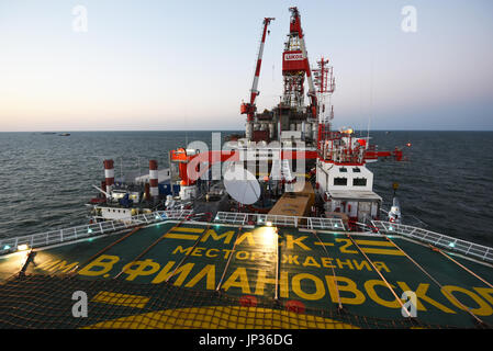 Oil rig platform on Lukoil Filanovsky oil field at the Caspian Sea, Astrakhan region, Russia Stock Photo