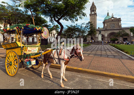 Kalesa at Manila Cathedral, Intramuros, Philippines Stock Photo