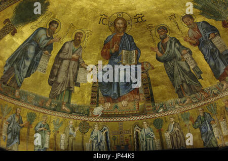 Italy. Rome. Basilica of St. Paul Outside the Walls. Mosaic of apse. Made by a Venetian artist. Christ is flanked by teh Apostles Peter, Paul, Andrew and Luke.19th century reconstruction (after fire 1823), of the 13th century original. Stock Photo