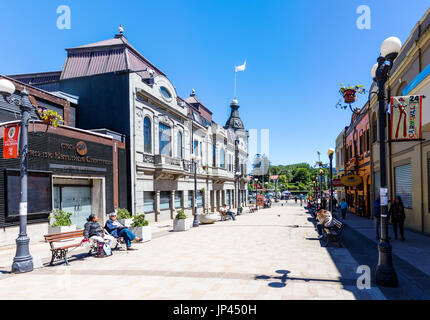 VALDIVIA, CHILE - OCTOBER 30, 2016: Pedestrian street Libertal in the center of Valdivia. This is the most beautiful and old part of the city. Stock Photo