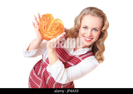 Portrait of cute smiling woman with pastries in her hands in the studio, isolated on white background. Stock Photo