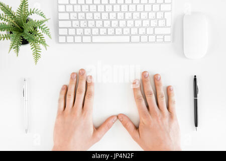 Top view of human hands and computer keyboard isolated on white Stock Photo