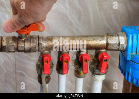 Home water supply, hand turn off safety shutoff valve. Stock Photo