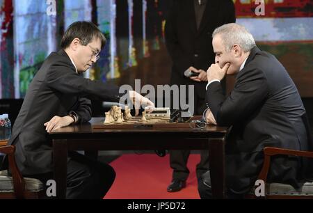 Former chess world champions Garry Kasparov, right, and Anatoly Karpov,  left, play an exhibition rematch in Valencia, Spain, Tuesday, Sept. 22,  2009. Chess eminences Kasparov and Karpov are dusting off their knights