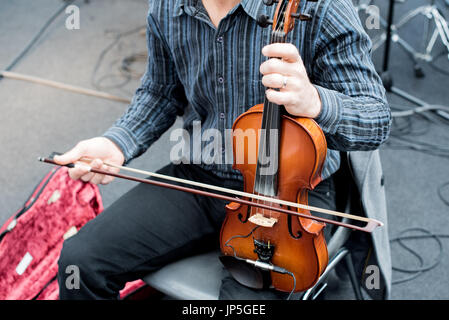 Violinist play violin in the typical Moroccan way Stock Photo