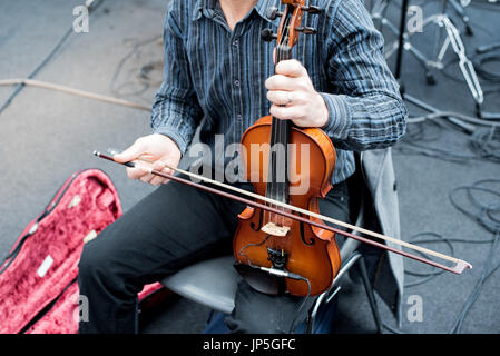 Violinist play violin in the typical Moroccan way Stock Photo